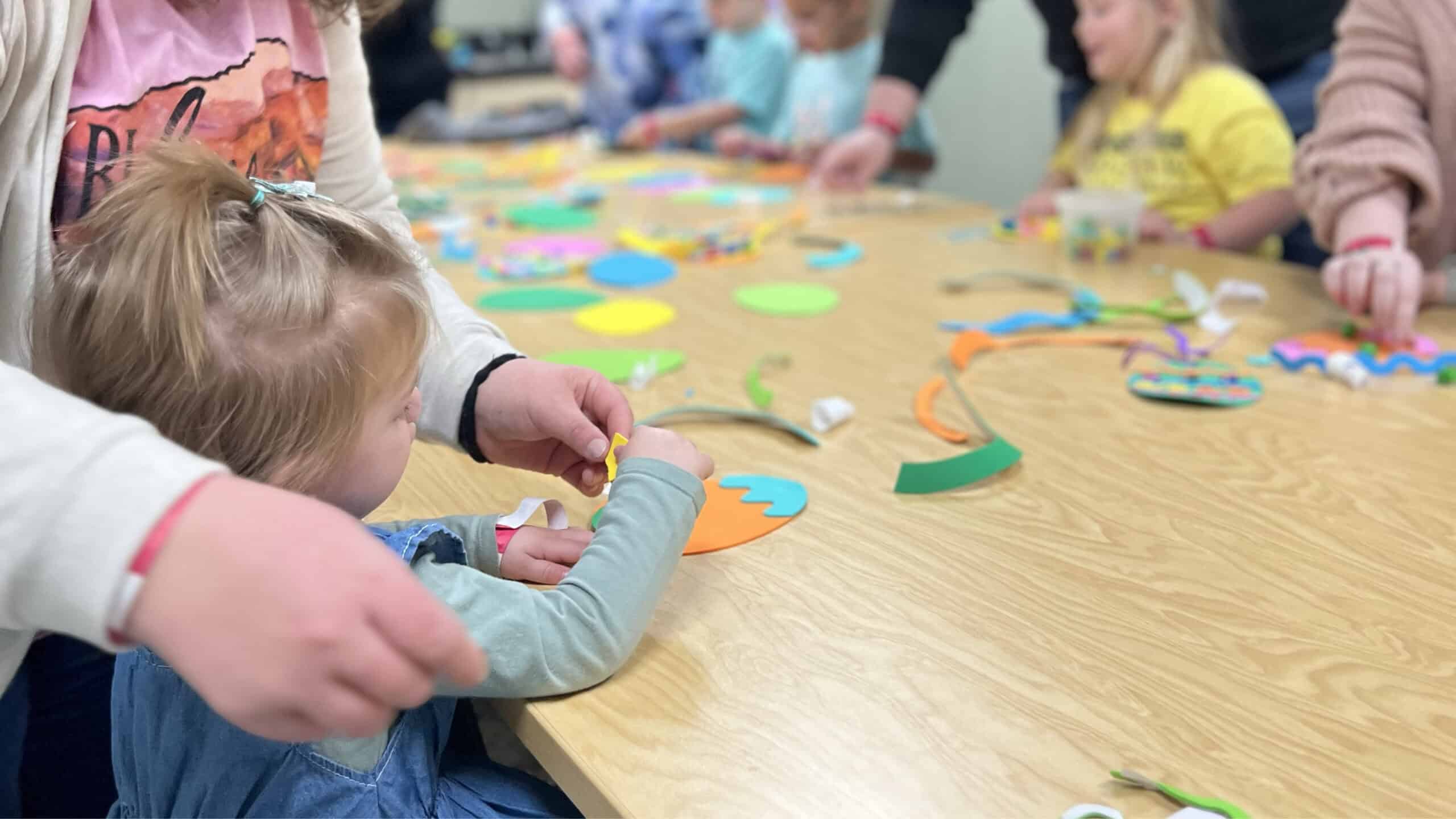 Children playing with Easter crafts